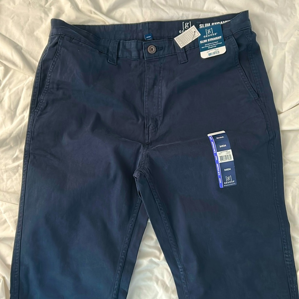 Men’s slim fit straight leg chinos. Colour is blue cove. Size 34×34.